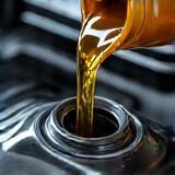 Fresh oil being poured into a BMW engine